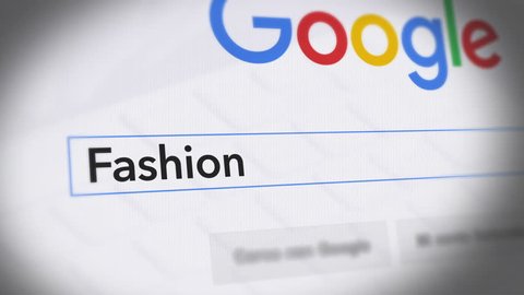 USA-Popular searches in 2015 
Google Search Engine - Search For Fashion
Monitor with reflection hands typing a search on google
