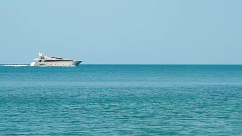 white speed yacht in open waters
