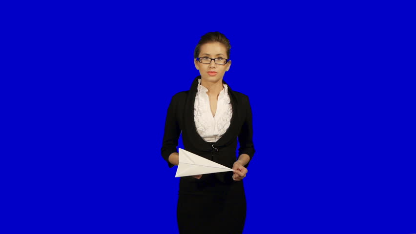 young businesswoman drop paper airplane, isolated over blue background
