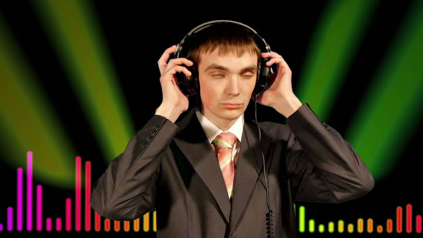 young businessman listen music in headphones, isolated over colorful effects