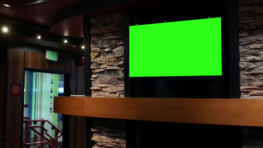 Display tv with green screen inside restaurant with 4k resolution | Shutterstock HD Video #21016159