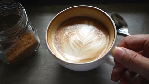 Top view of coffee latte, slow motion