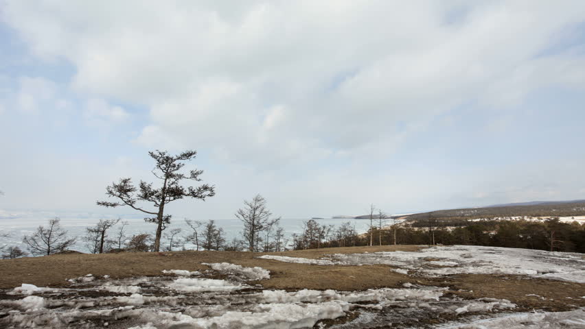 4K. Movement of clouds above the forest on Olkhon Island, Lake Baikal, Irkutsk region, Russia. Ultra HD, 4096x2304