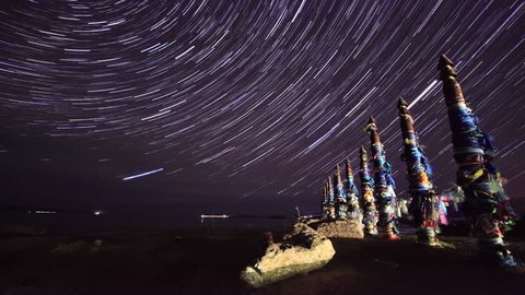 4K. Serge Poles. Starry night over the island Olkhon. Burkhan Cape, Olkhon island, Lake Baikal, Irkutsk region, Russia, Ultra HD, 4096x2304