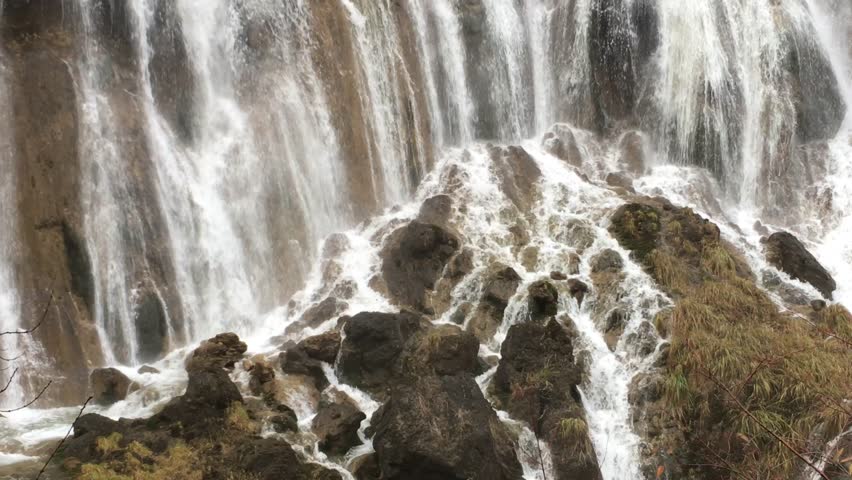 Grand  Great waterfalls at Jiuzhaigou National Park  where is the UNESCO World Heritage in Sichuan , China in  Autumn in November located in  in  Tibetan-Qiang of Sichuan ,China