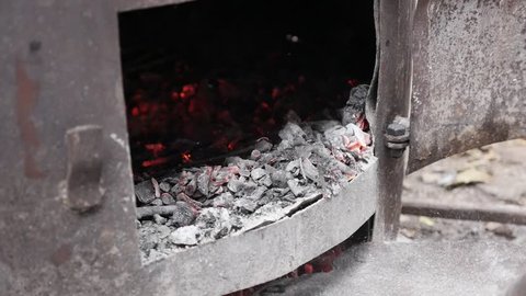 Rakija prepare boiler fire in slow motion distilled process procedure 1080p FullHD footage - Tree logs in metal tube burning as part of making Serbian alcoholic hard liquor beverage 1920X1080 HD video