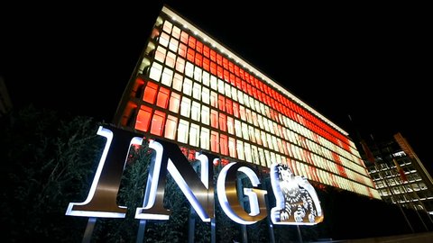 BRUSSELS, BELGIUM - Circa 2016: ING Bank headquarter in central business district of Brussels at night. The ING Group is a Dutch multinational banking and financial services corporation in Amsterdam