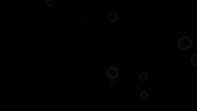 Motion green round. High quality royalty free stock footage and visuals featuring green bokeh orb shaped particle motion on black backgrounds.