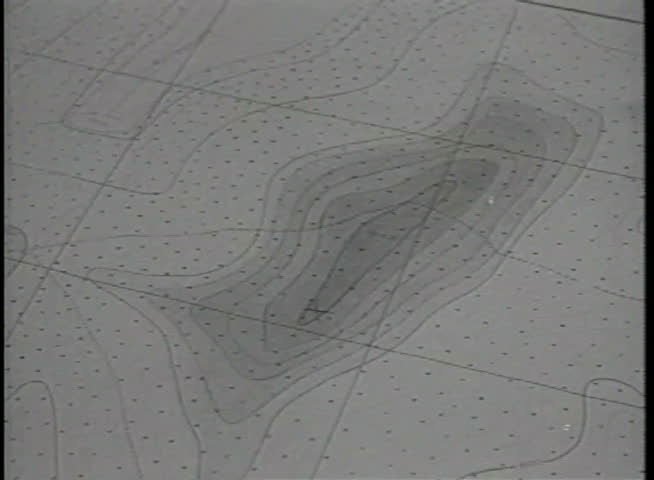 Close-up of person mapping out military strategy