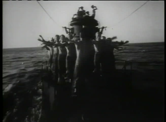 Soldiers exercising on submarine deck