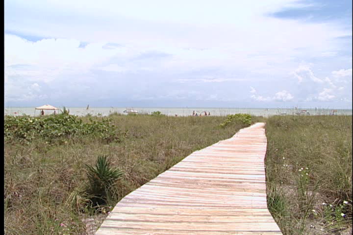 A boardwalk leading to the beach.