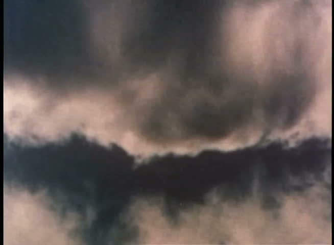Cloudy sky reflected in water