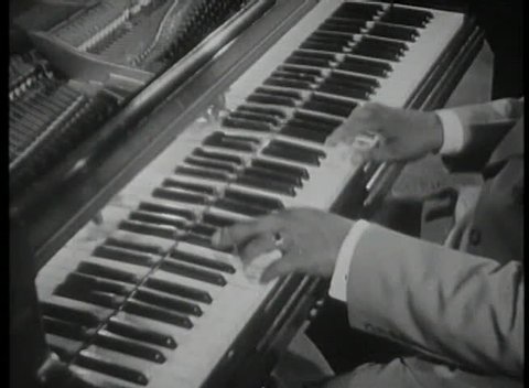 Medium shot of jazz musician playing piano Stock Video