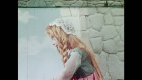 ANIMATED 1950s: Rapunzel falls in love with young man. Witch comes to visit Rapunzel and climbs through window. Witch gets angry.