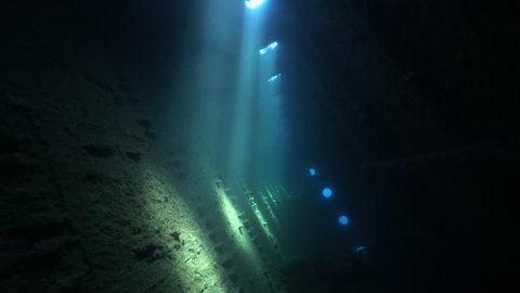 Dark corridor of shipwreck with vibrating sunlight - Umbria, Sudan