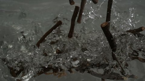 licorice root in water splashes
