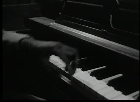 Medium shot of hands playing piano Stock Video