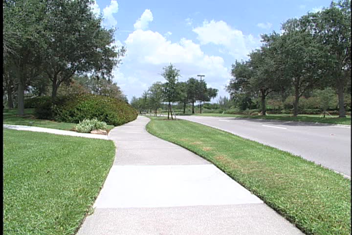 A sidewalk and road