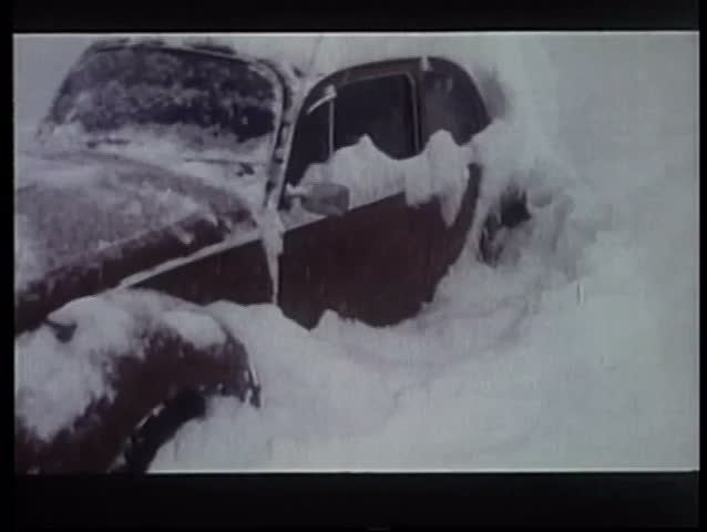 1970s car covered in snow