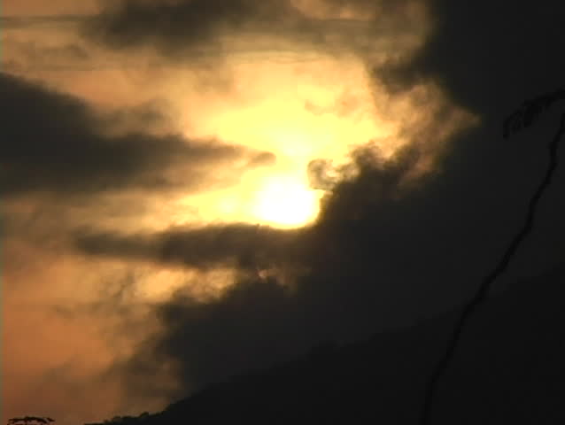 Close up of sun as clouds go by #2