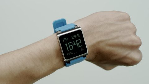 Electronic watch on a male wrist