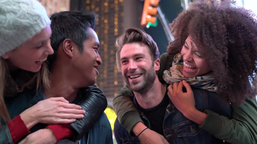 Group of friends having fun at Times Square, NYC                               