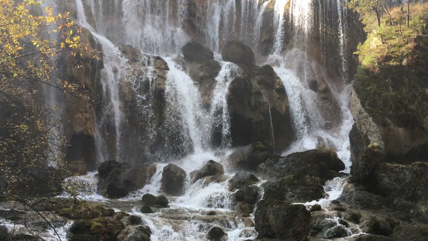 Pearl Shoal Waterfall at Jiuzhaigou National Park  where is the UNESCO World Heritage in Sichuan , China in  Autumn in November located in  in  Tibetan-Qiang of Sichuan ,China
