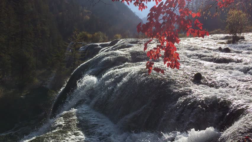 Pearl Shoal Waterfall at Jiuzhaigou National Park  where is the UNESCO World Heritage in Sichuan , China in  Autumn in November located in  in  Tibetan-Qiang of Sichuan ,China
