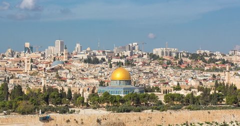 Panoramic view to Jerusalem Old city and the Temple Mount, Dome of the Rock and Al Aqsa Mosque from the Mount of Olives in Jerusalem, Israel, - Time Lapse, Zoom Out