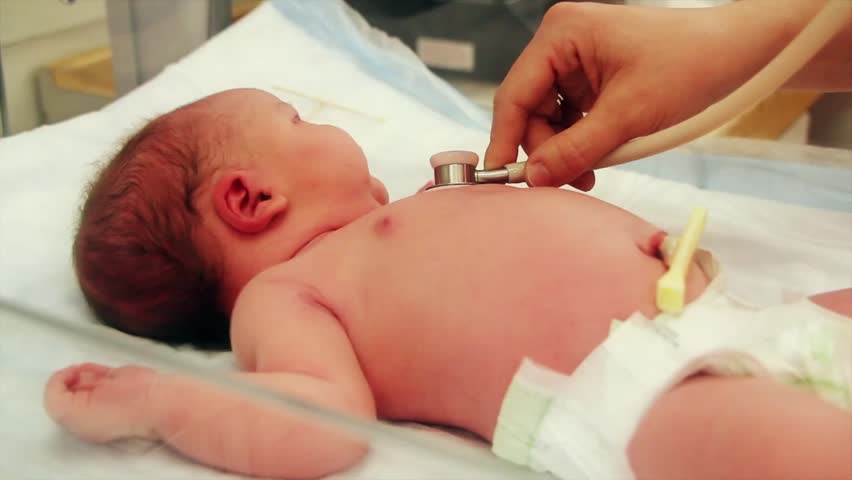 A newborn baby at the hospital born just minutes before being cleaned by the