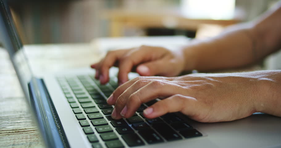 typing fingers laptop