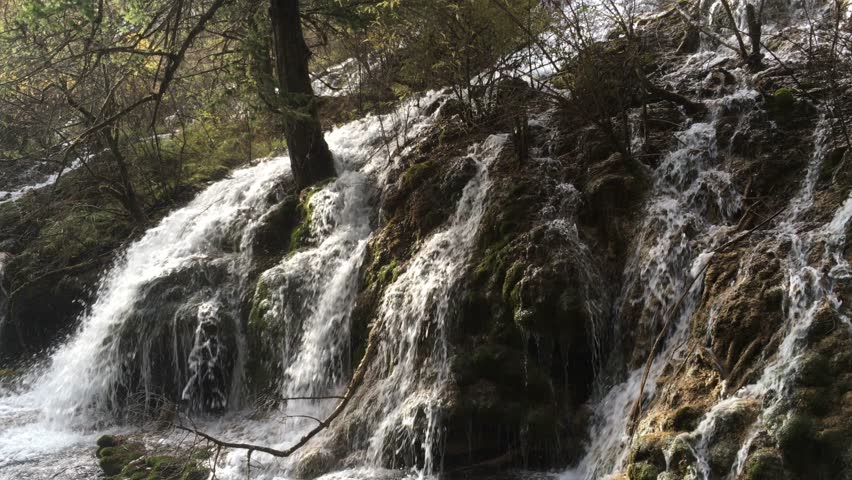 Pearl Shoal Waterfall at Jiuzhaigou National Park in Sichuan , China in  Autumn in November located in  in  Tibetan-Qiang of Sichuan ,China
