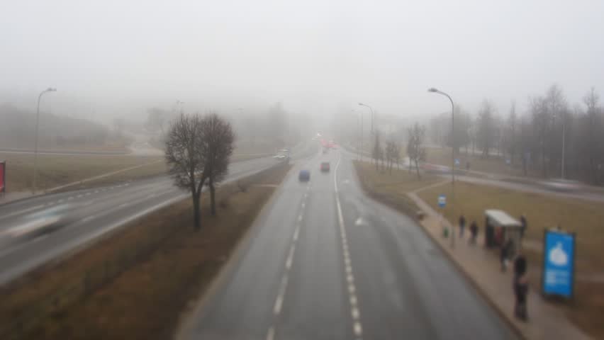 Morning traffic in the fog, time-lapse, tilt-shift