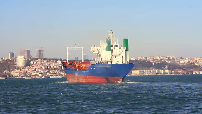 Cargo ship sailing through Straits in Istanbul, Turkey