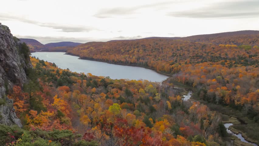 Lake of the Clouds and Cliffside Twilight and Dramatic Clouds 4K UHD Timelapse