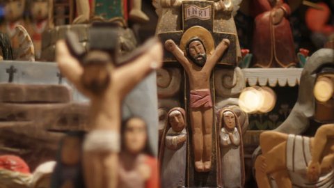 Wooden Jesus figures at store display