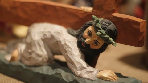 Wooden figure of Jesus Christ at store display