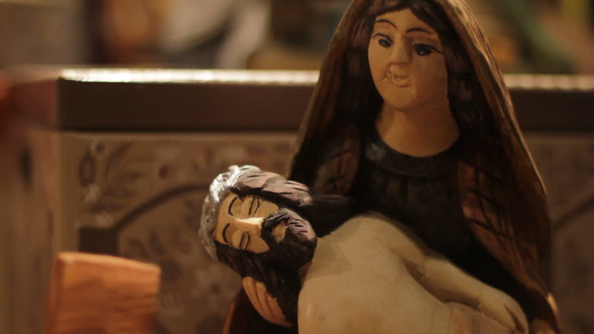Wooden Jesus Christ and Virgin Mary at store display