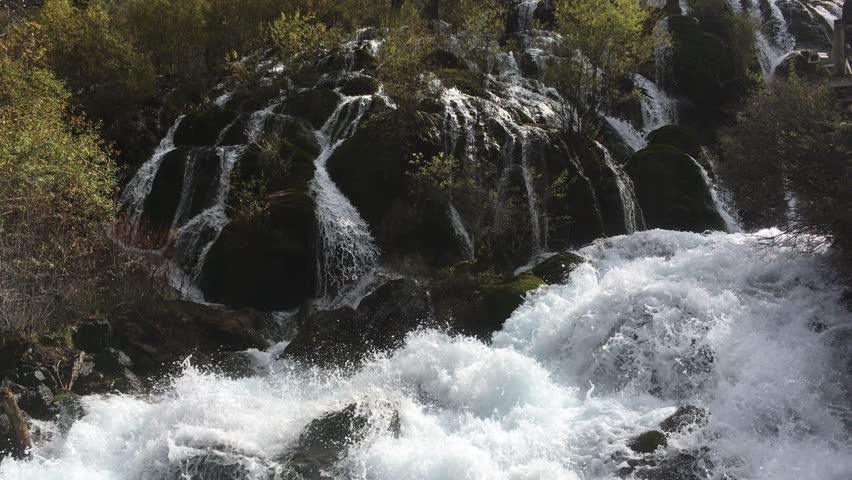 Pearl Shoal Waterfall at Jiuzhaigou National Park   in Sichuan , China in  Autumn in November located in  in  Tibetan-Qiang of Sichuan ,China