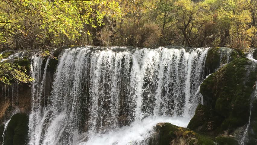 Pearl Shoal Waterfall at Jiuzhaigou National Park in Sichuan , China in  Autumn in November located in  in  Tibetan-Qiang of Sichuan ,China