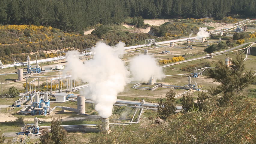Steam rises from a geothermal bore field in New Zealand. The scalding hot water