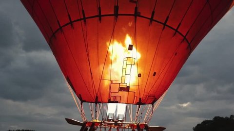 Hot air balloon preparing for take off in the Kenyan savanna. 