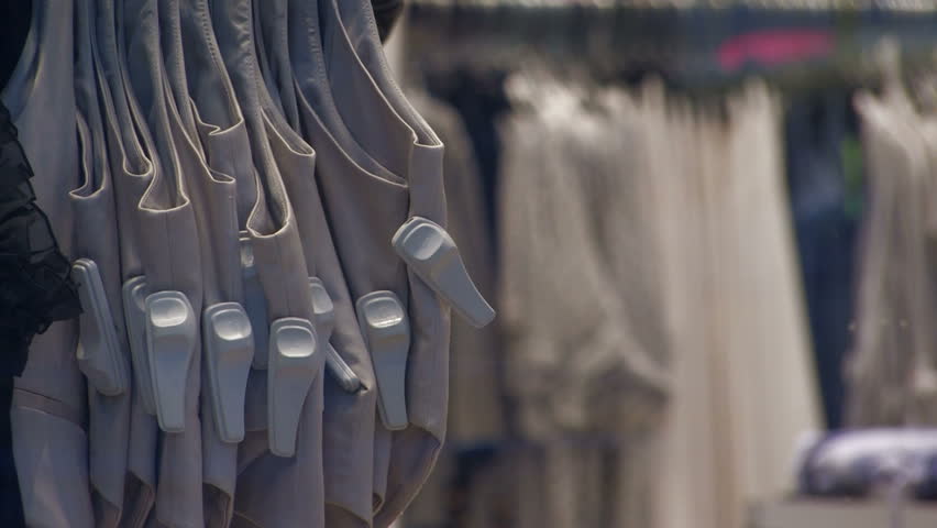 Clothes on hangers with safety clips