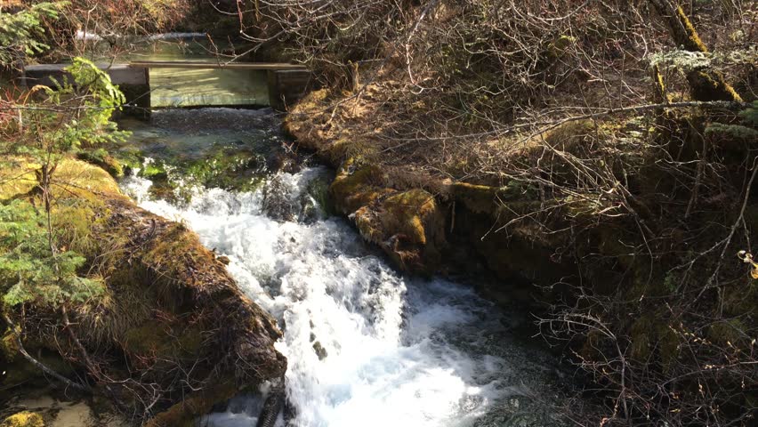 Huanglong Mountain with beautiful nature waterfalls with lime stone  in Sichuan , China on sunny day 