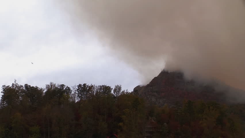 Lake Lure, North Carolina November 11, 2016.  Wildfires burn out of control across the Appalachian mountains sending smoke from the ridges of the mountains