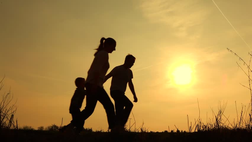 family walk at sunset
