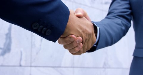 Slow-Mo Close-Up Of Standard Business Man Suit Handshake With Hands In Focus
