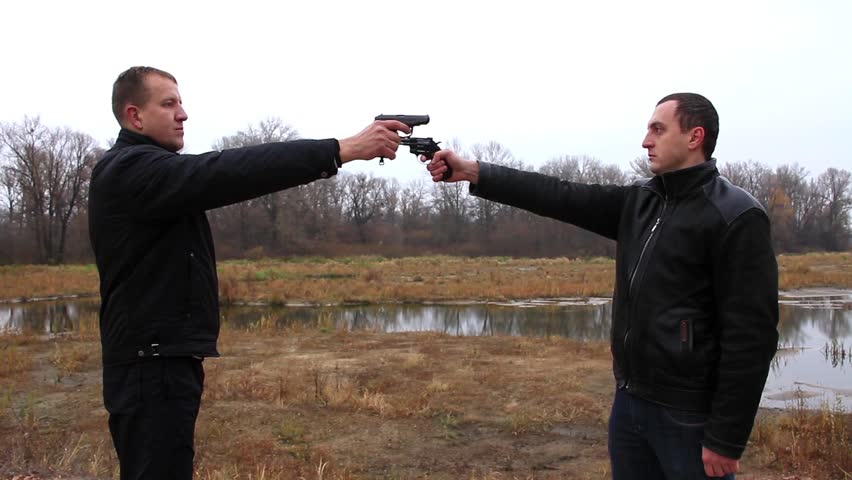 Two Men Pointing Guns at Stock Footage Video (100% Royalty-free) 2130347 |  Shutterstock