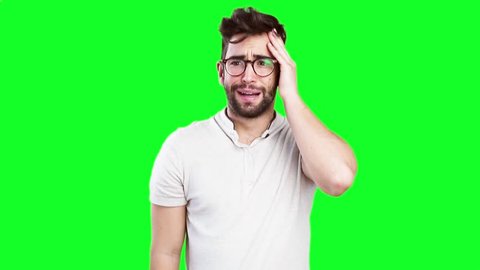 worried young man on green screen