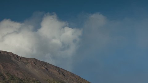 The incredible volcano island of Stromboli off the coast of Sicily, Italy. Stromboli is one of the worlds most active volcanos and is famous for its regular daily explosions